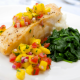 Fish and mango salsa with vegetables